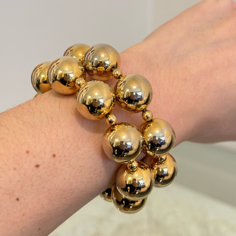 Authentic Vintage Dior wrapped bracelet in gold tone hardware